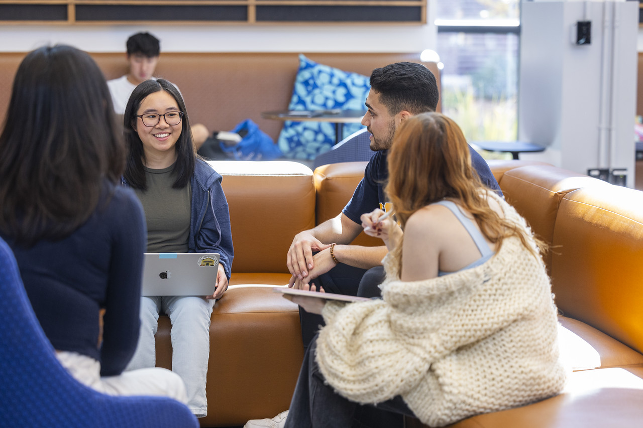 Students gather together in the Oxford College Student Center to study and collaborate.