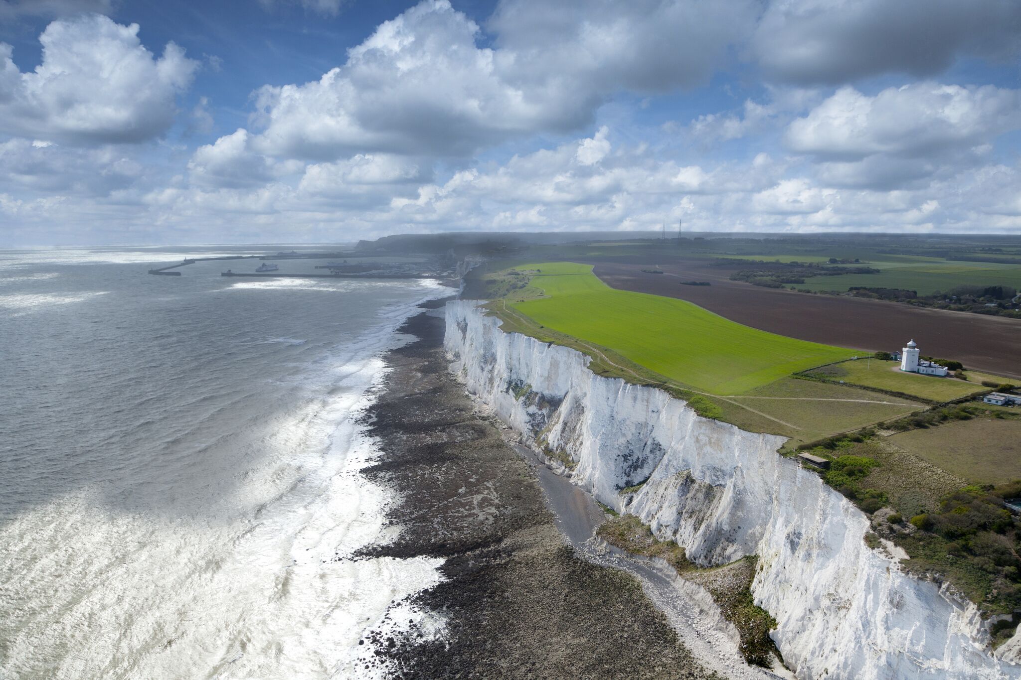 the white cliffs of dover meeting the ocean